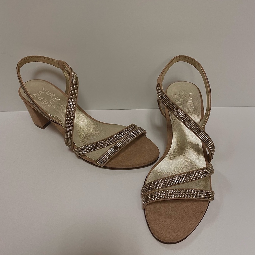 A brand new, never used, beautiful pair of two inch shoes!